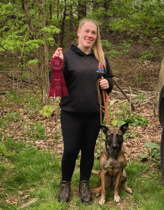 Emily Davis professional dog trainer in Hopkinton working with a dog